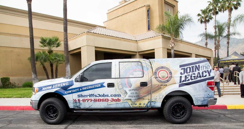 Sheriffs Jobs van parked next to building